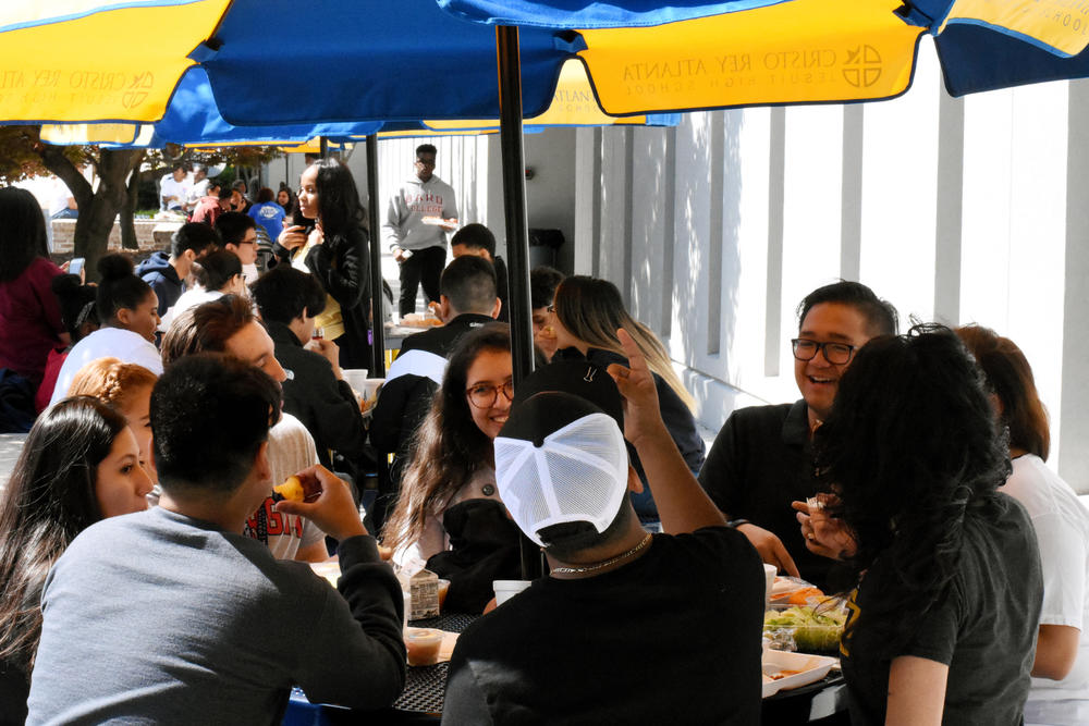 Seniors at Cristo Rey Atlanta enjoy lunch outside their downtown campus on their college day. It's the one day all year they did not have to wear their school uniform.