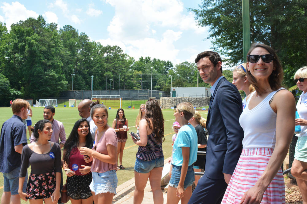 Democrat Jon Ossoff and his fiancÃ©e, Alisha Kramer, arrive at a 