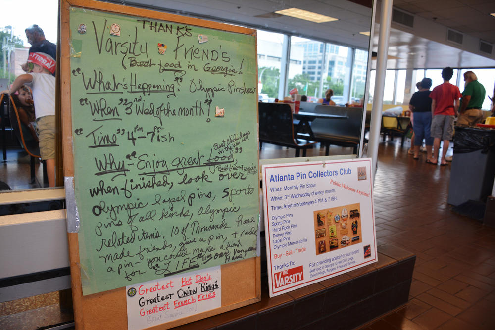 Signs advertising the pin meetup in the Varsity's dining room. A few patrons stopped in to check out the event, but, for the most part, attendees were seasoned regulars.