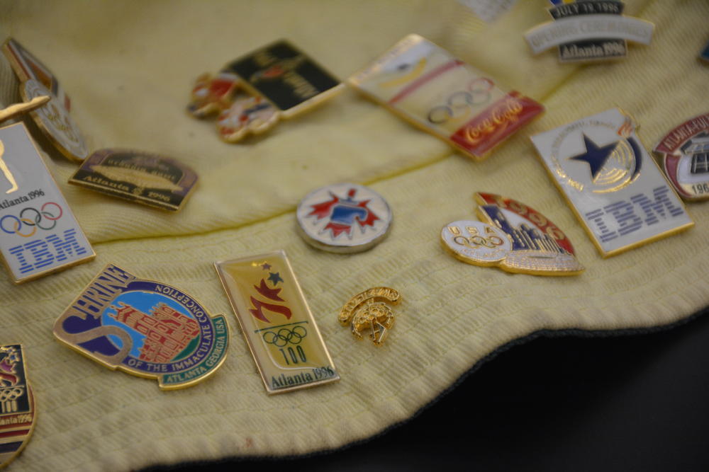 The pins on Lindsay Thomas's hat. Some were (moderately) valuable.