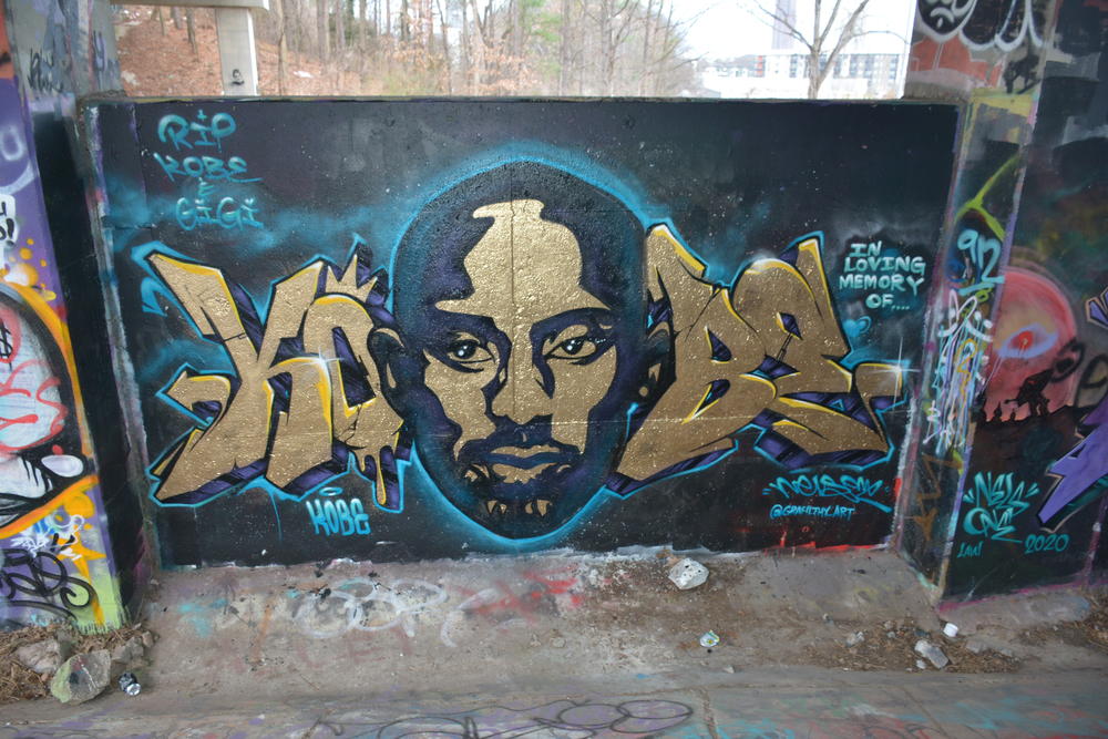 Kobe Bryant tribute murals have begun to appear at the public art space near the Old Fourth Ward Skatepark. 