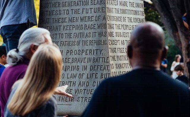 After the Stand With Charlottesville candlelight vigil on Aug. 13, 2017, in Decatur, Ga., attendees gather to discuss the controversial 