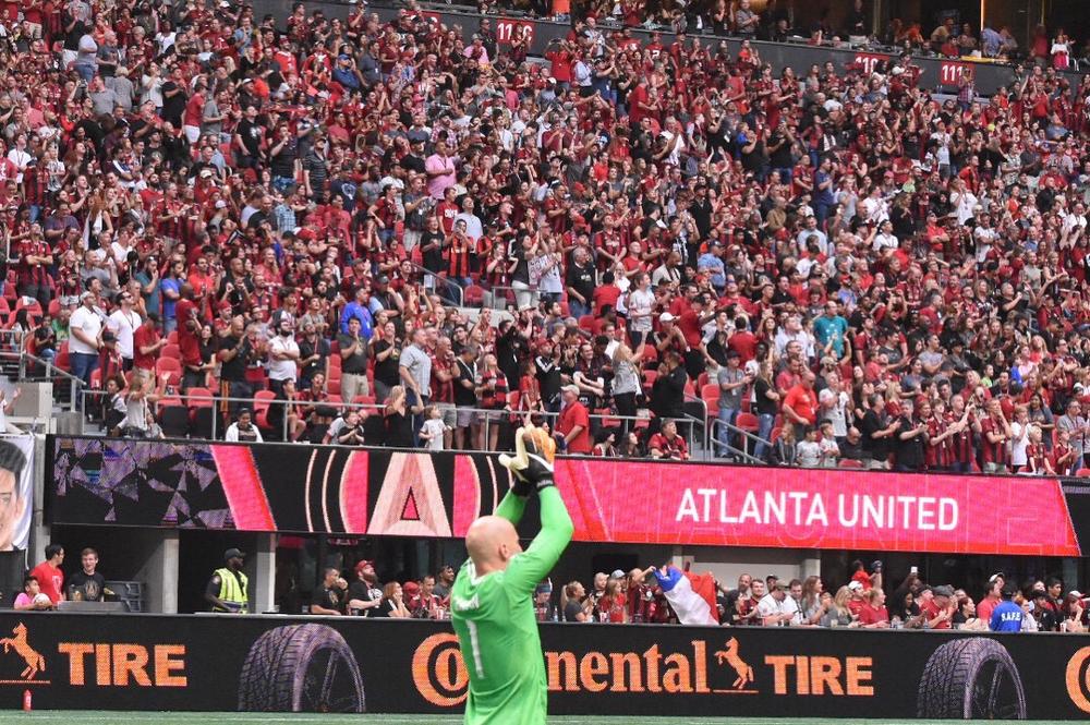 Atlanta goalkeeper Brad Guzan (1) salutes a sold out crowd in the season finale.