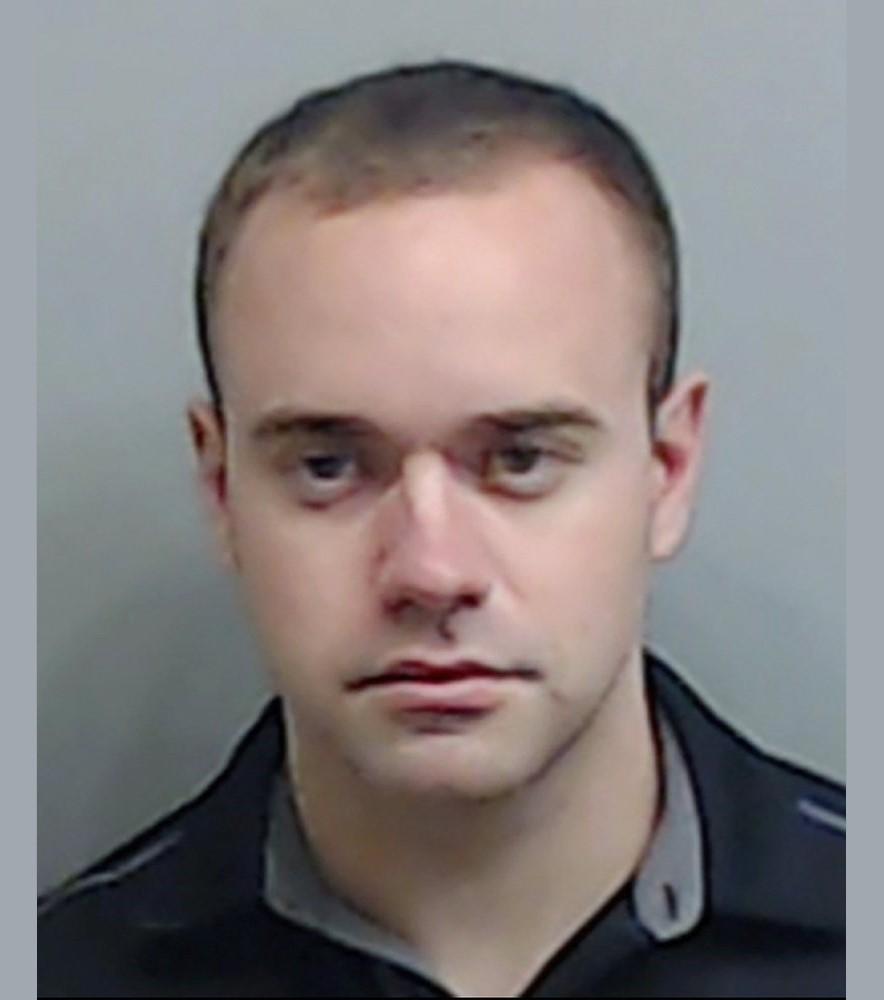 In this booking photo made available Thursday, June 18, 2020 by the Fulton County, Ga., Sheriff's Office, shows Atlanta Police Officer Garrett Rolfe.