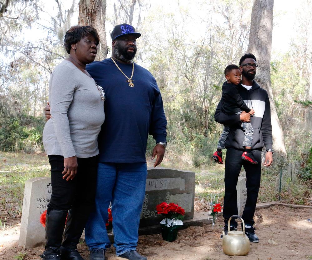 Four generations of Scott-West family watch as the ceremony begins. 
