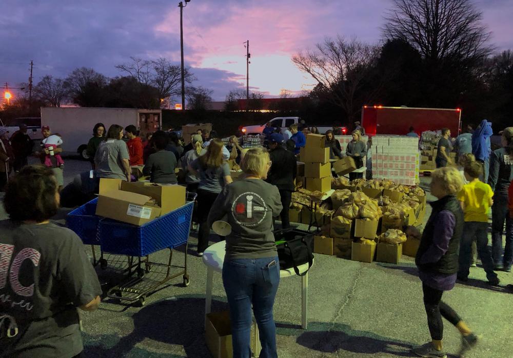 iServe Ministries prepares to give out 30,000 pounds of food through its mobile food pantry to families in need.