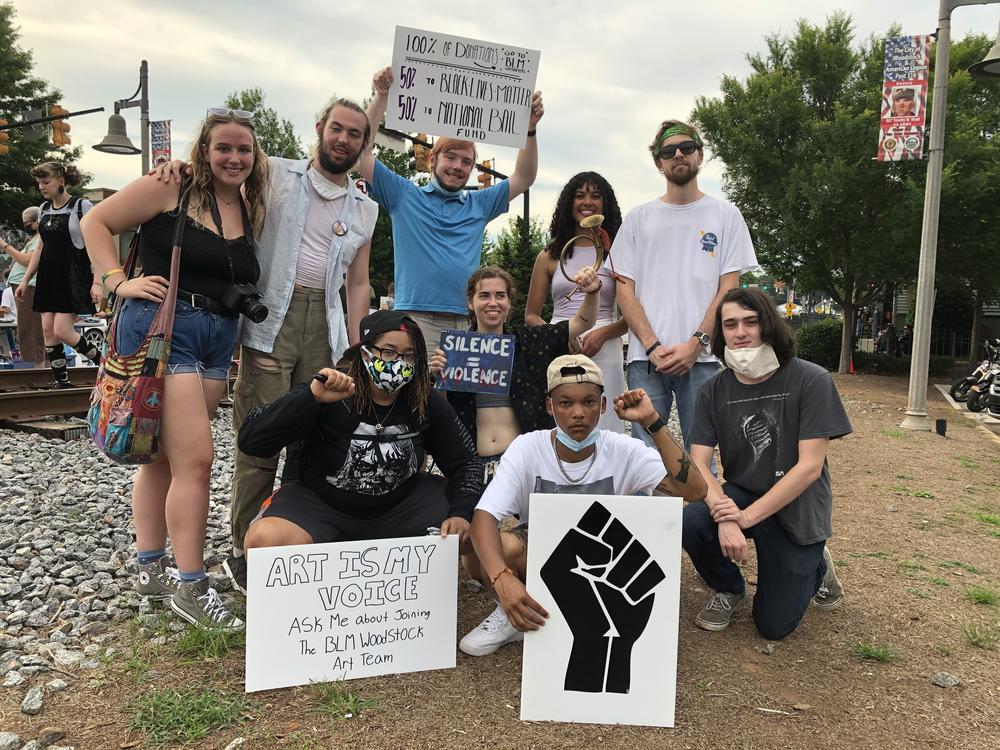 A group of leaders associated with the Black Lives Matter Woodstock Facebook group and demonstrations in downtown Woodstock.