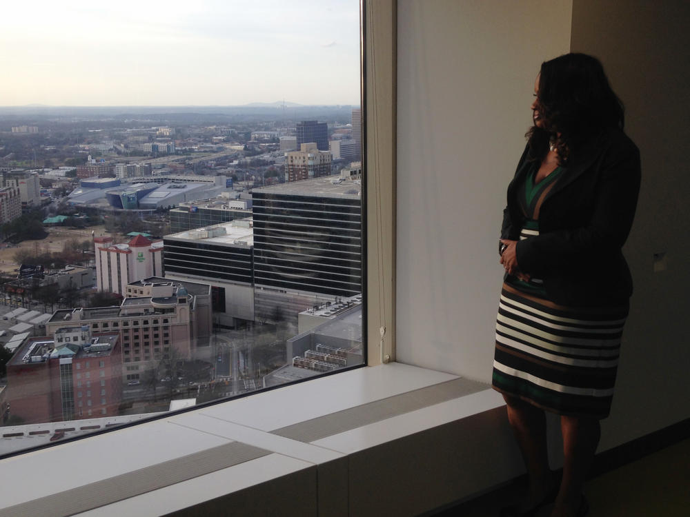 Dawn Luke looks west from Invest Atlanta's offices toward Vine City and English Avenue.