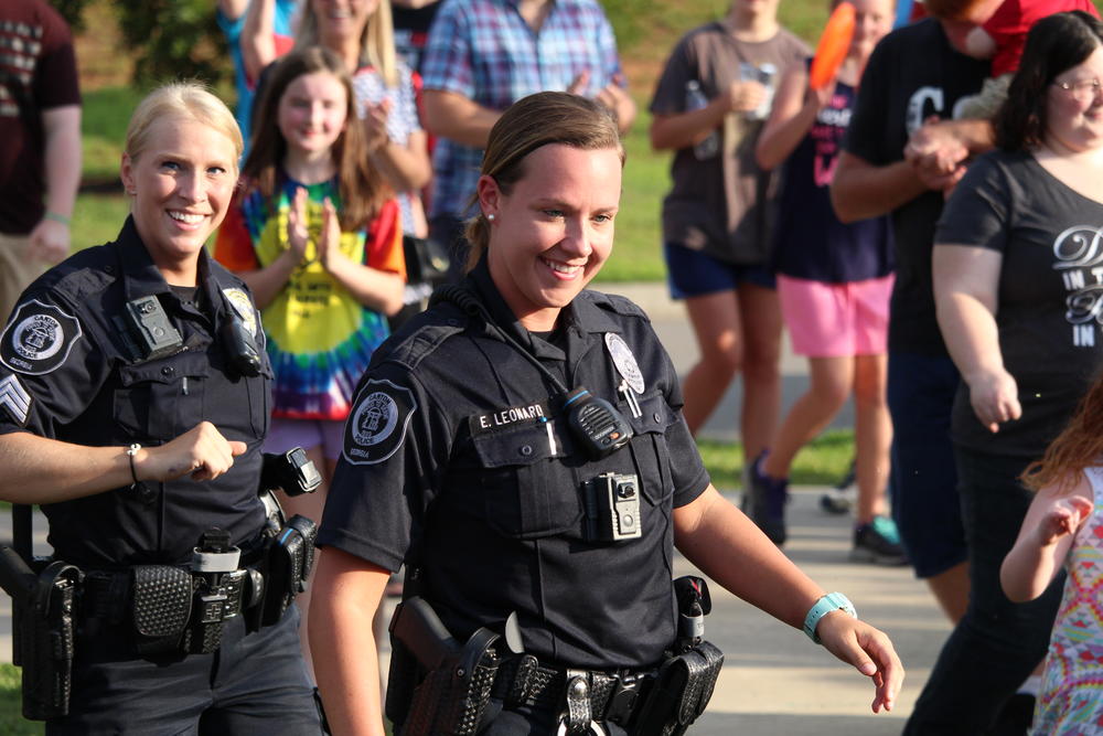 Officers walk from the 