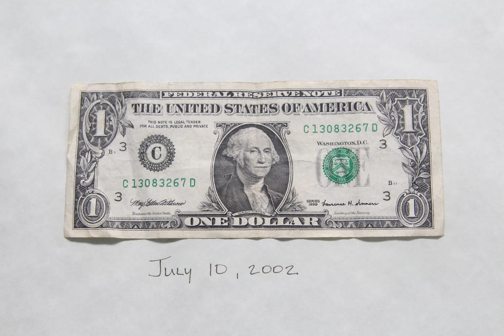 The first dollar earned in the 119 Cobb Parkway Ken Stanton Music store is framed in Kenny Stanton's office. He bought the location when Mars Music hovered on the same street.