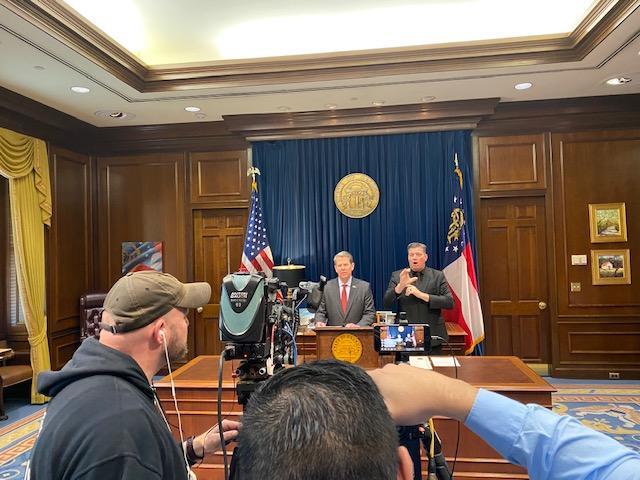 Gov. Brian Kemp declares public health emergency at a press conference on March 14.