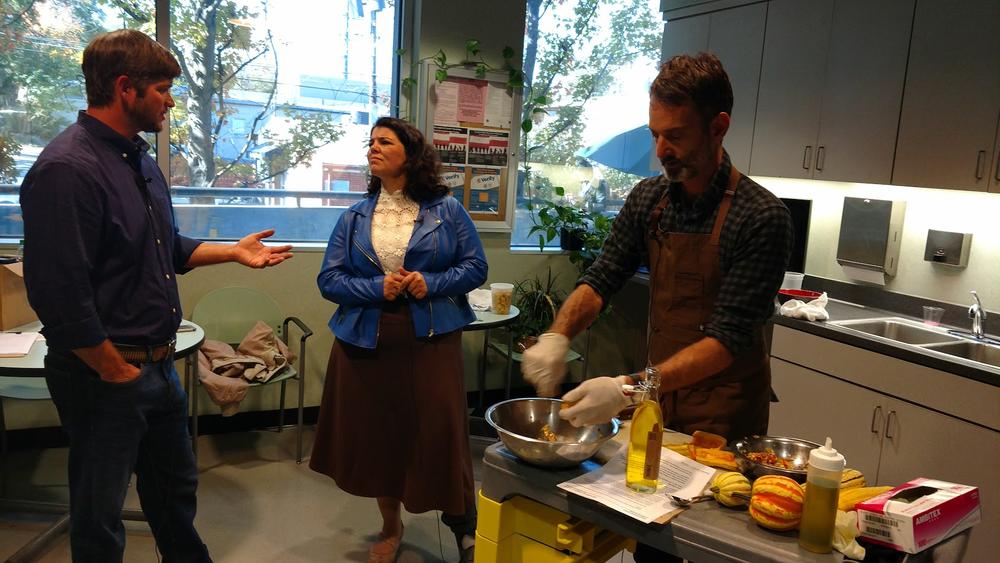 Host Celeste Headlee talks with peanut farmer Clay Oliver (l) and Atlanta chef Steven Satterfield (r).