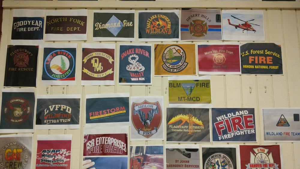 A wall at the Ramah Darom camp features some of the firefighting companies from across the country that shoowed up to help contain the wildfires in North Georgia.