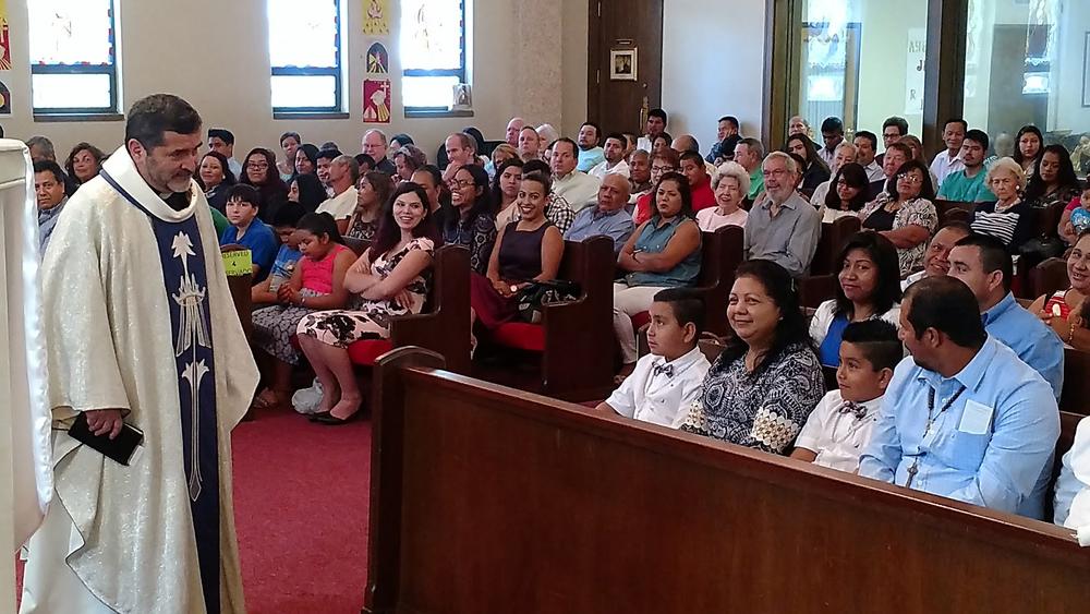 Father Alfonso Gutierrez presides over a packed house on a Sunday morning in Moultrie, Georgia. In 2005, he was a pastor in Tifton, Georgia, where six Mexican immigrants were killed during a robbery at a trailer park.