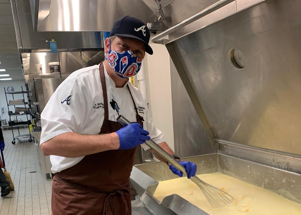 Atlanta Braves Chef Pete Smithing cooking up some cheese sauce at the ballpark.