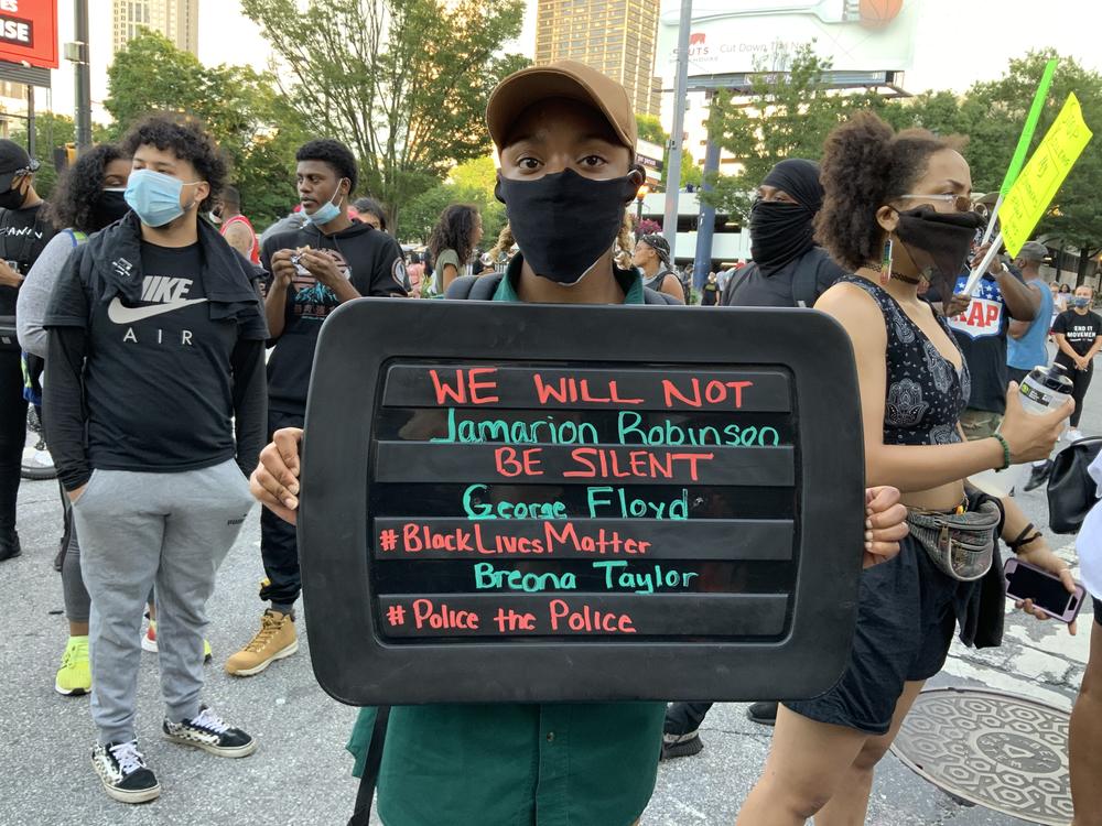 People have been making signs and protesting racial injustice for more than a week after the latest death of a black person by a white police officer.