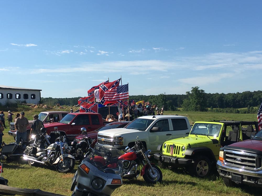 Dozens of flags fly at Nash Farm Park Battlefield during a rally.