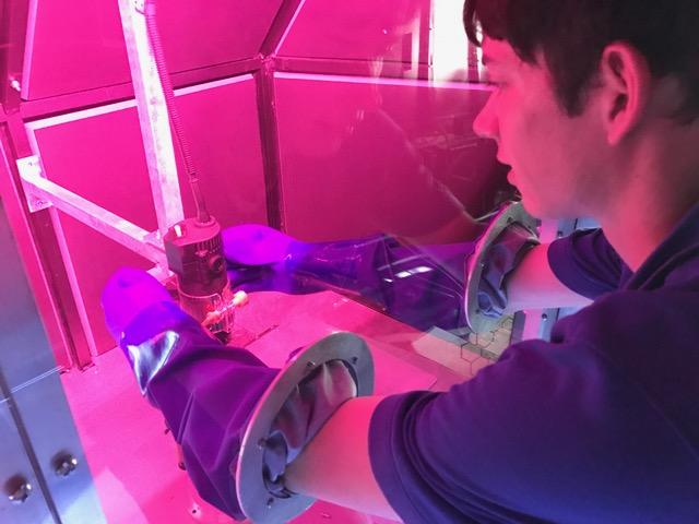 Joe Reisigl of Atlanta explores the laboratory space inside the rover. 