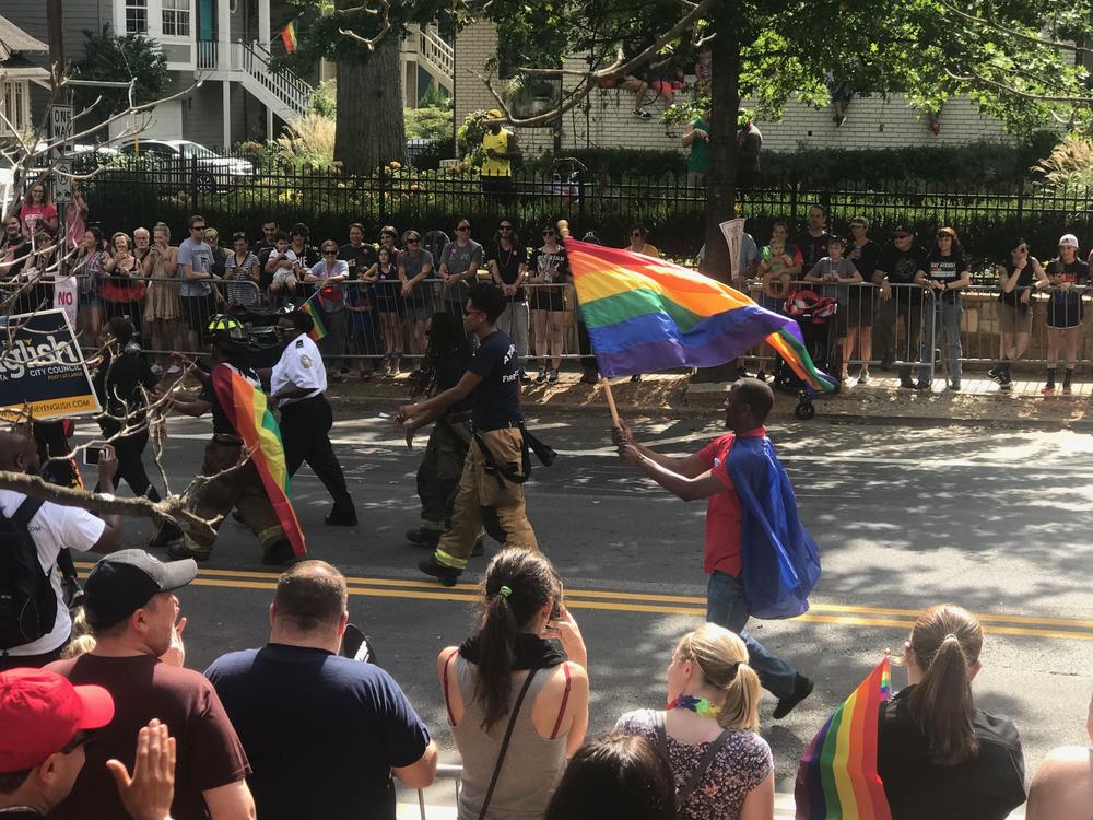Atlanta police and firefighters march in the Pride Parade. 