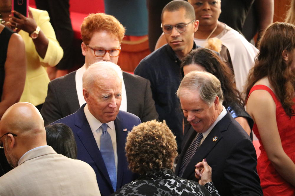 Presidential candidate and former Vice President Joe Biden and Alabama Sen. Doug Jones greet members of the congregation before Sunday school at 16th Street Baptist Church in Birmingham, Alabama.