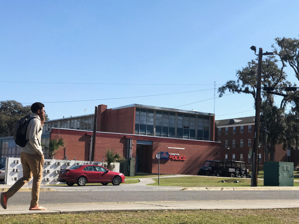 A Savannah State student walks past campus police headquaters. After a fatal shooting in February 2018 the University system of Georgia sent in officers from other campuses. 