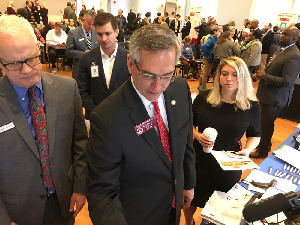 Incoming secretary of state Brad Raffensperger demos a voting machine from Hart InterCivic in downtown Atlanta Thursday January 3, 2019.