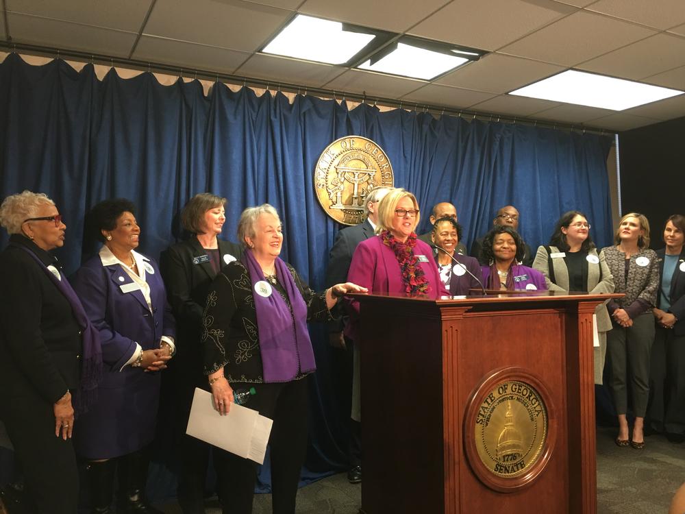 Senator Renee Unterman (R-Buford) speaks at the podium in the senate press office during a press conference on the Equal Rights Amendment.
