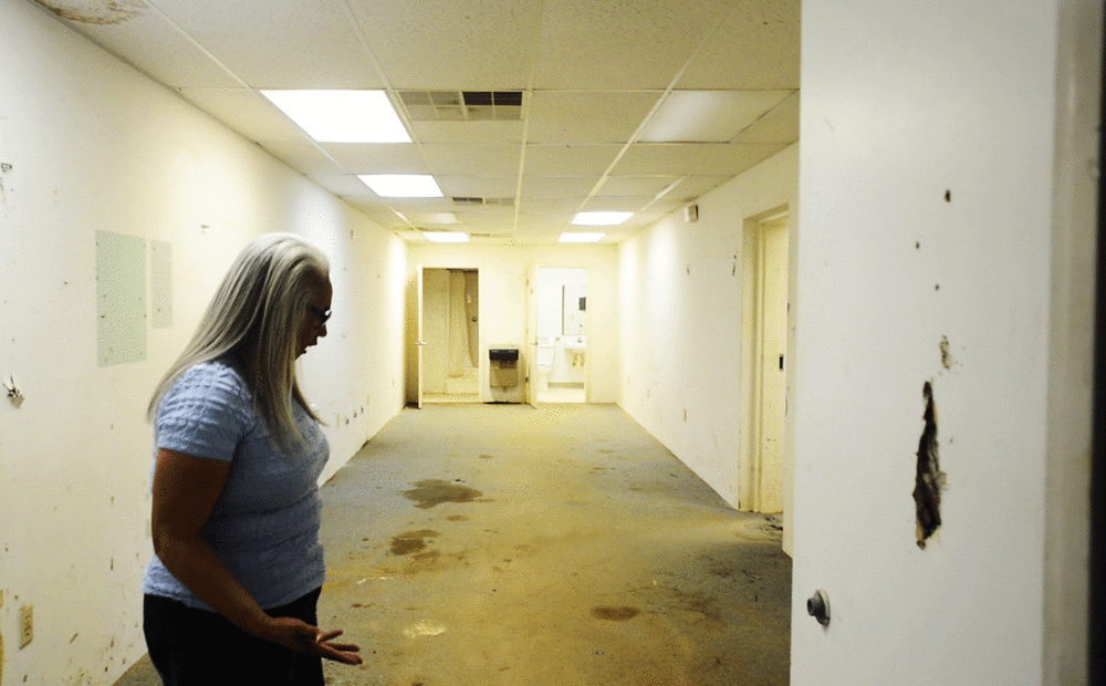 Carol Barner-Seay tries to look through the later additions to the Leesburg Stockade to remind herself what the place looks like when she was jailed there. While some of the other Leesburg Girls remain to some degree broken by the event, Barner-Seay says she can handle coming back. 