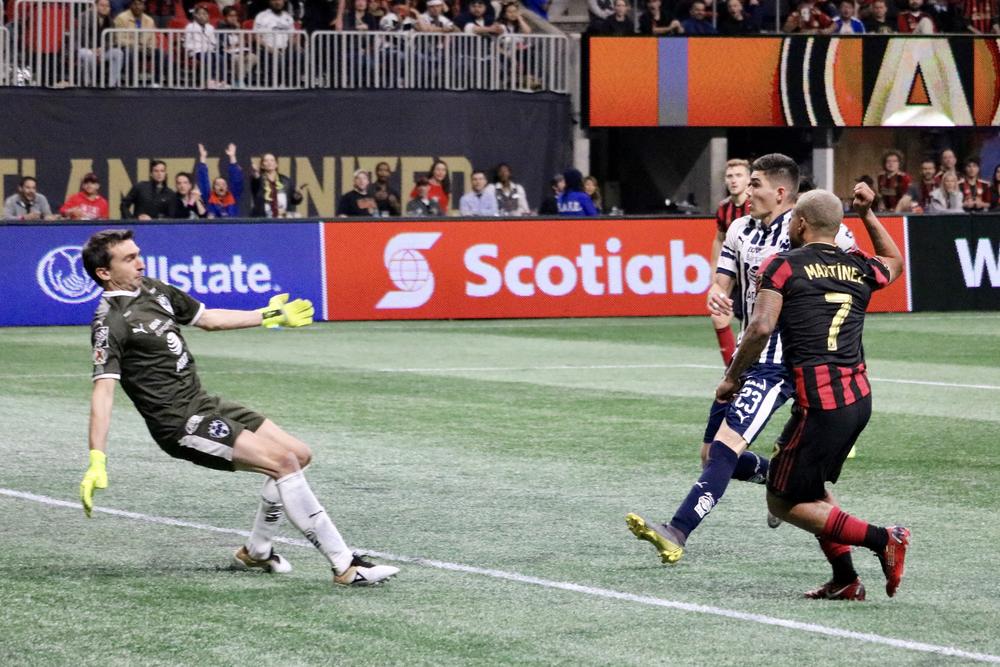 Atlanta United forward Josef Martinez scores a goal past Monterrey goalkeeper Marcelo Barovero during the second half in a Concacaf Champions league quarterfinal match on Wednesday, March 13, 2019, in Atlanta. 