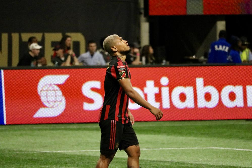 Atlanta United forward Josef Martinez glances at the Mercedes Benz Stadium halo board after an uncsuccessful shot on goal.  