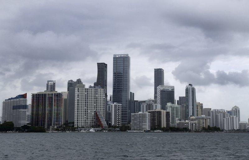 Clouds loom over the Miami skyline Thursday, May 14, 2020. According to the National Hurricane Center website, 