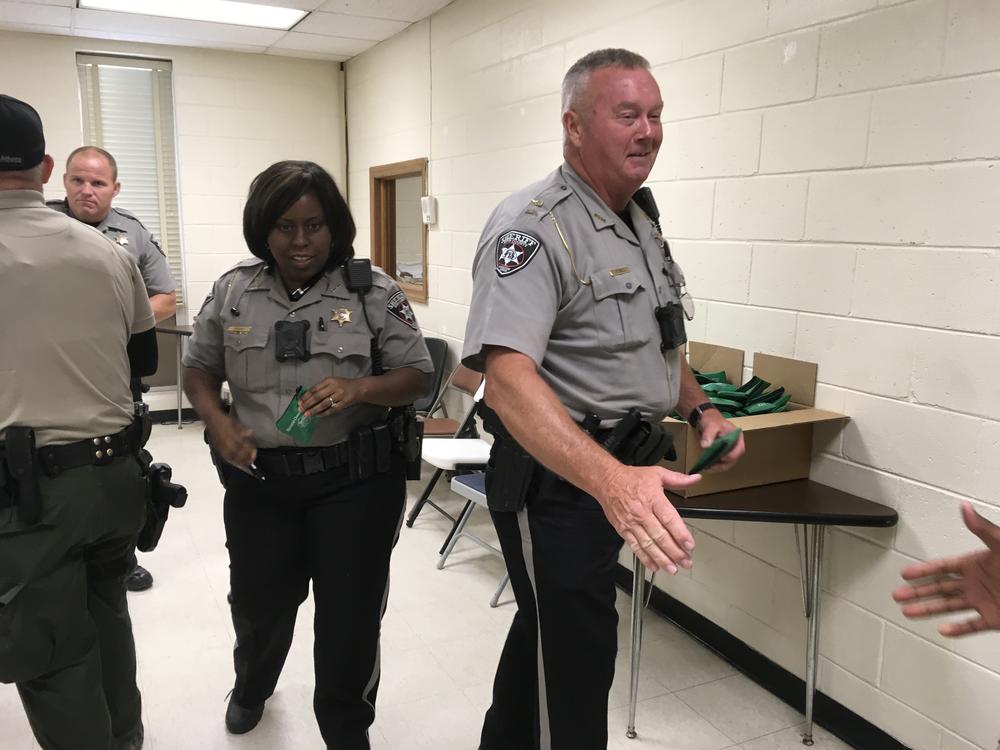 Bibb County Sherriff's Officers receive their Narcan kits after training class