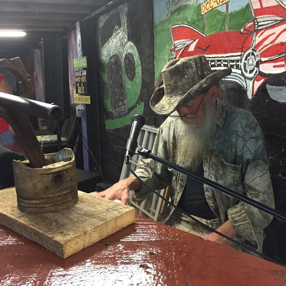 Fast Eddie works at Old Car City USA. He performs a jingle he wrote.