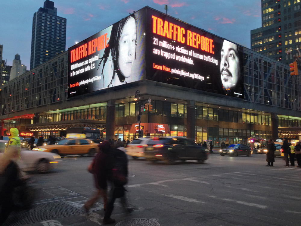Billboards advertising Clear Channel Outdoor's and Polaris Project's 
