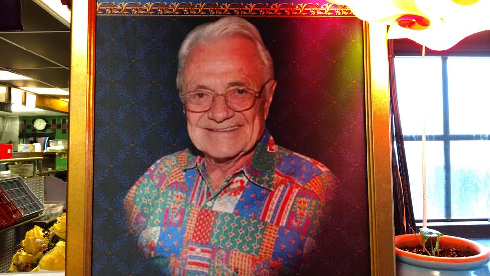 A portrait of Richard Thomas hangs inside R. Thomas Deluxe Grill in Atlanta.