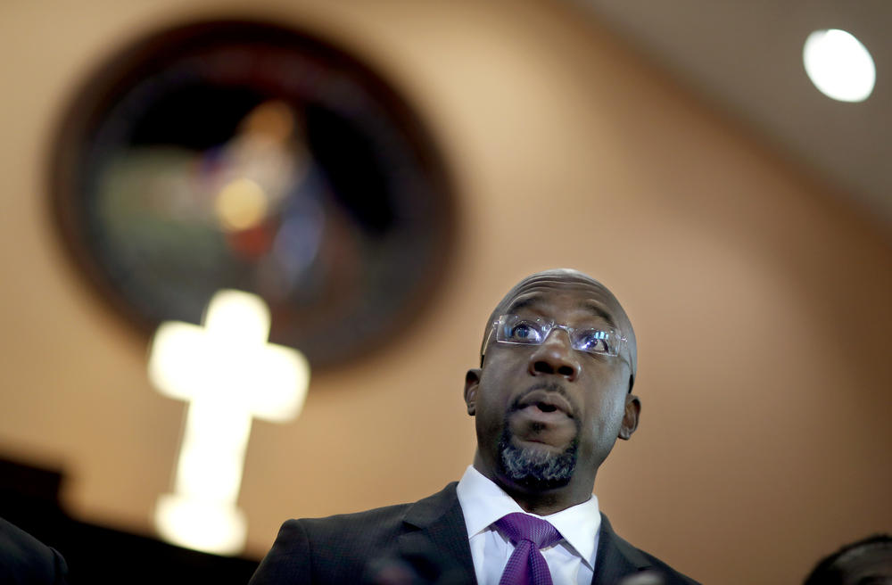 Rev. Raphael Warnock speaks at the pulpit of Ebenezer Baptist Church in Atlanta, GA., where he is senior pastor.