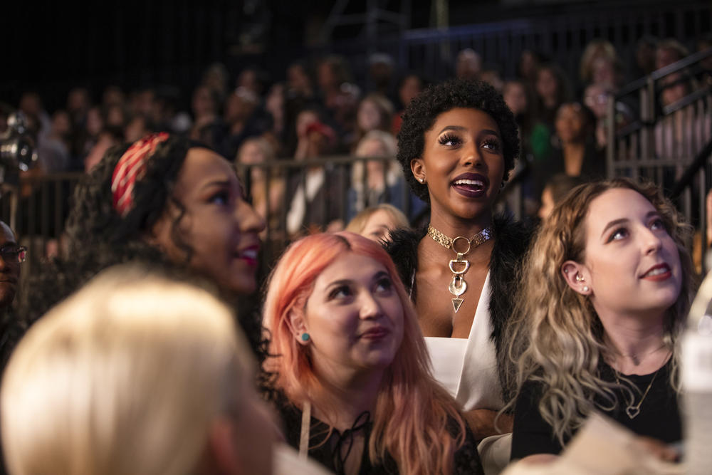 Members of the audience react during the G.R.I.T.S. taping.