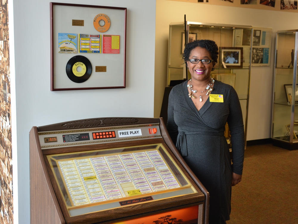 Shelby White, head of Waffle Records, with one of the restaurant chain's old jukeboxes.