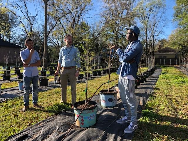 Apprentice arborist Robert Hartwell (L), Savannah Sustainability Director Nick Deffley and apprentice Jason Smith