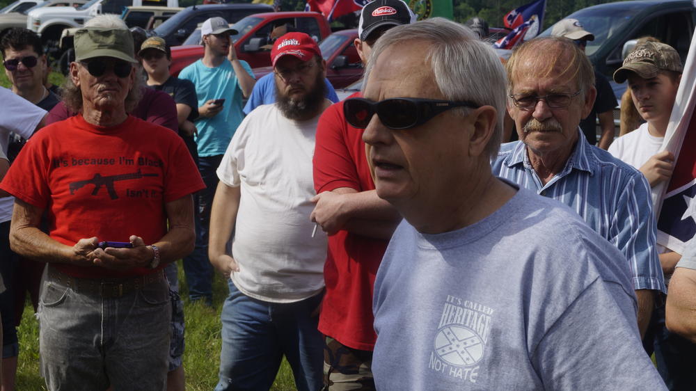 68-year-old Don Meyer of Conyers speaks to attendees at a rally held at Nash Farm Battlefield Park.