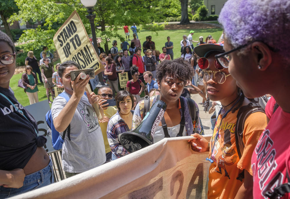 Protesters marched on the steps of UGA's Administration Building this spring to demand reparations.