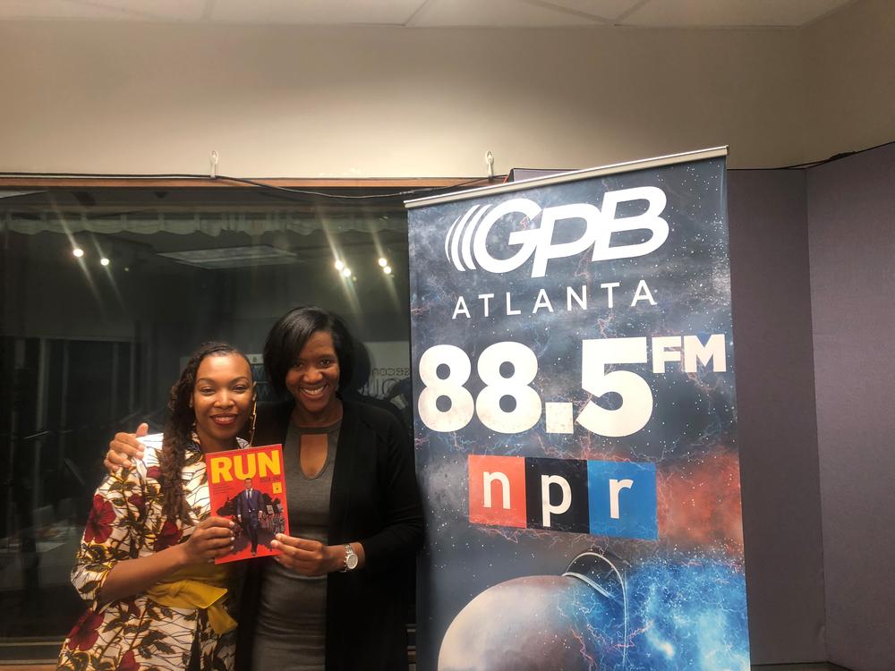 Afua Richardson [left] and Leah Fleming [right] pose with an early version of 'RUN', the illustrated story of John Lewis.