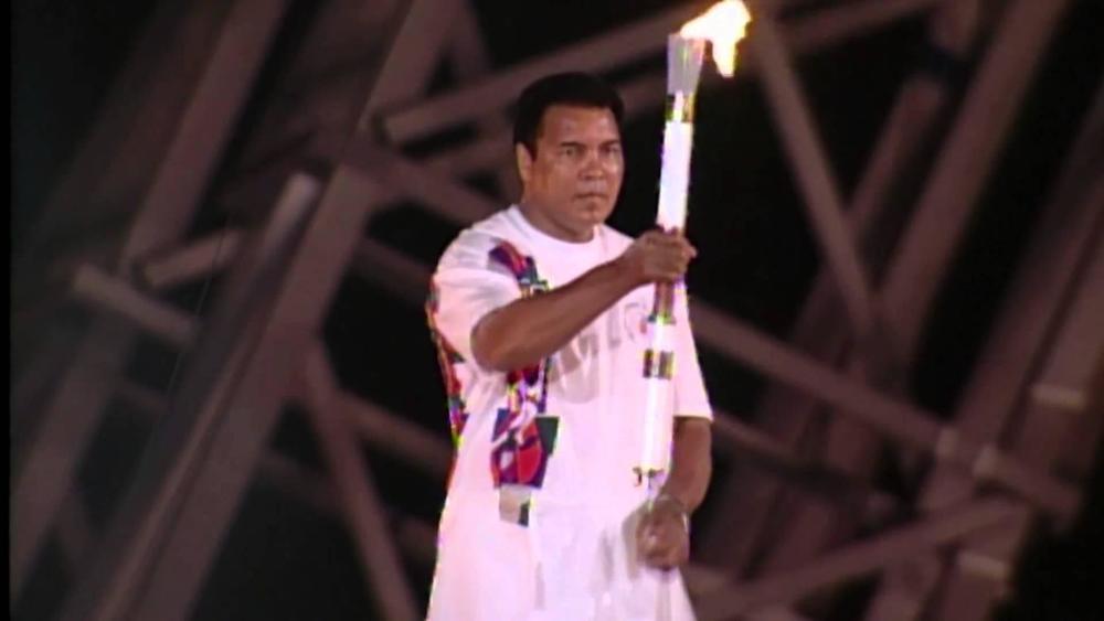 Muhammad Ali holding the Olympic torch during the 1996 games in Atlanta.