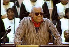 Alley Pat speaking at Civil Rights leader, Hosea Williams' funeral in 2000.