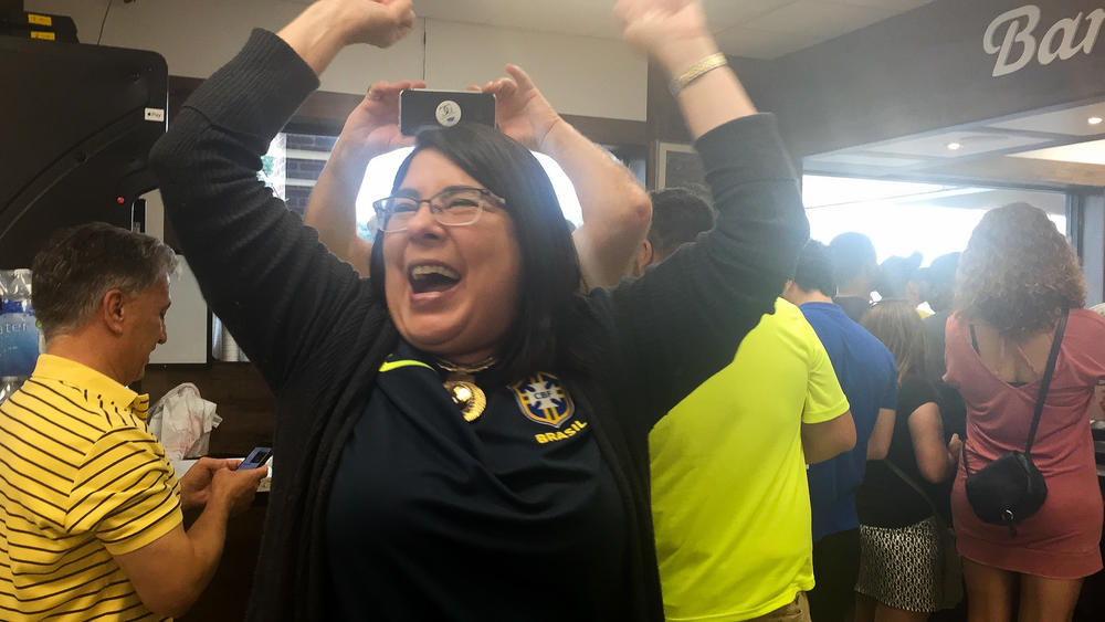 Ana Rangel, who moved from Brazil to the United States more than three decades ago, celebrates after Brazil scores its second goal. 