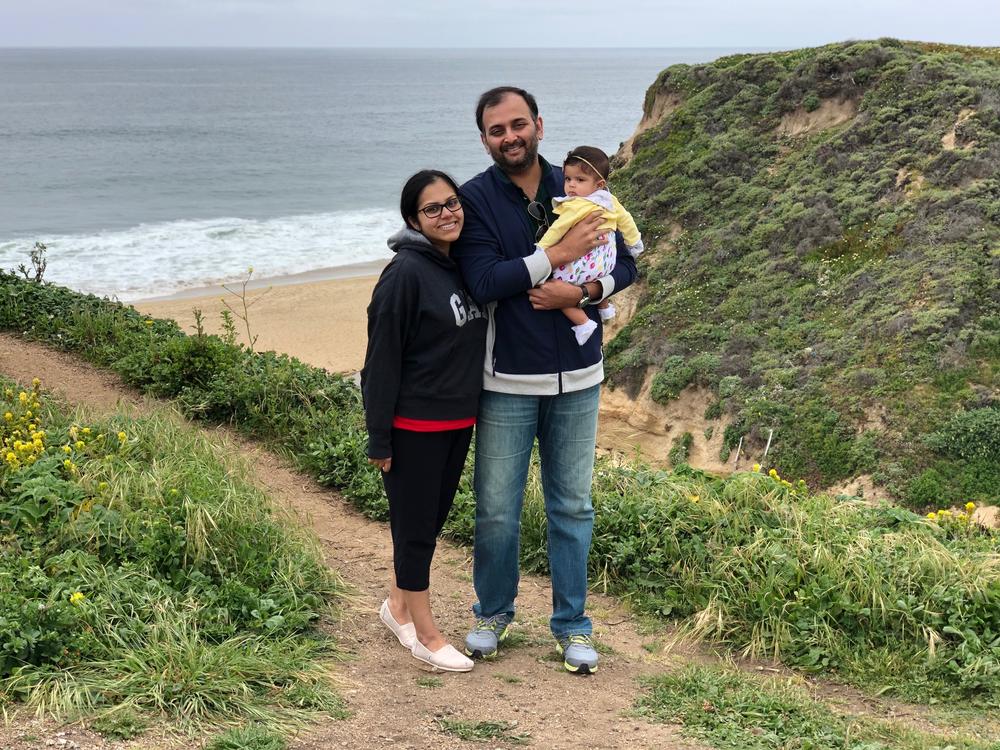 Anitha, Subbu, and their one-year-old daughter, Aadya.