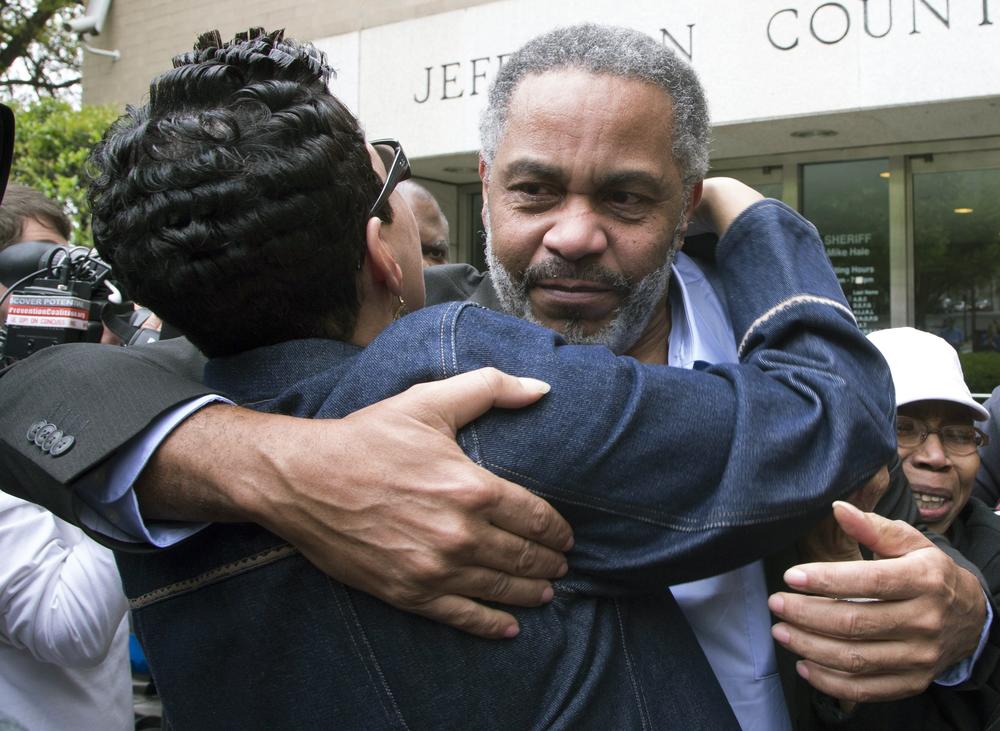 Pat Turner, left, hugs Anthony Ray Hinton as he leaves the Jefferson County jail in Birmingham, Alabama.