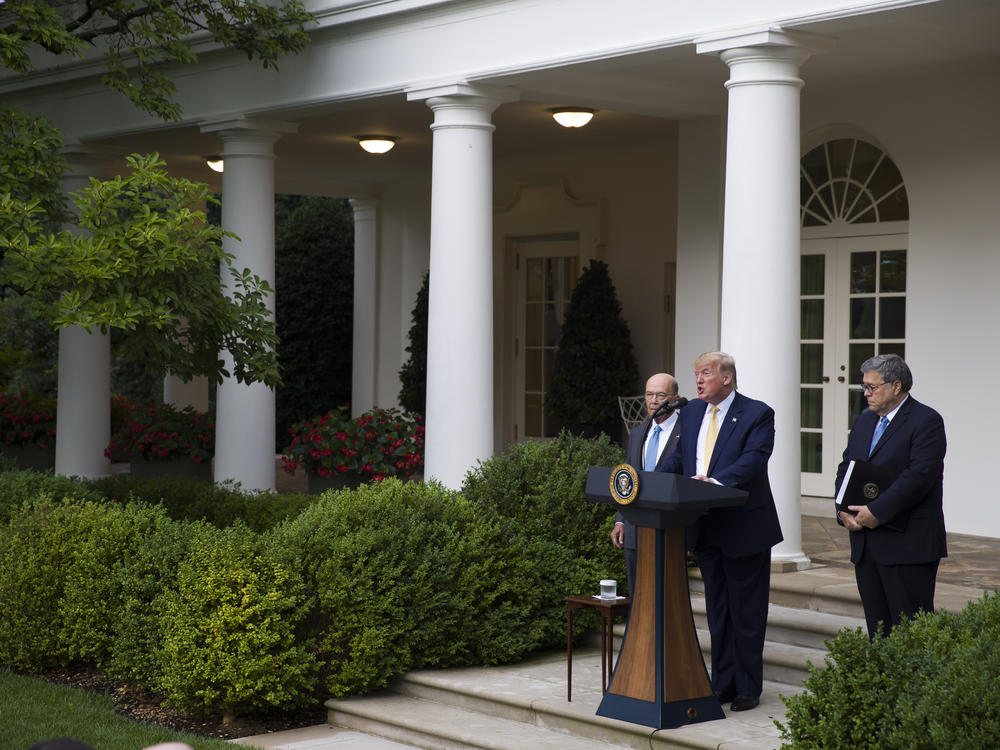 South Dakota has agreed to share driver's license and state ID records with the U.S. Census Bureau as part of efforts to carry out an executive order for citizenship data that President Trump announced in July 2019 with Commerce Secretary Wilbur Ross (left) and U.S. Attorney General William Barr in the White House Rose Garden.
