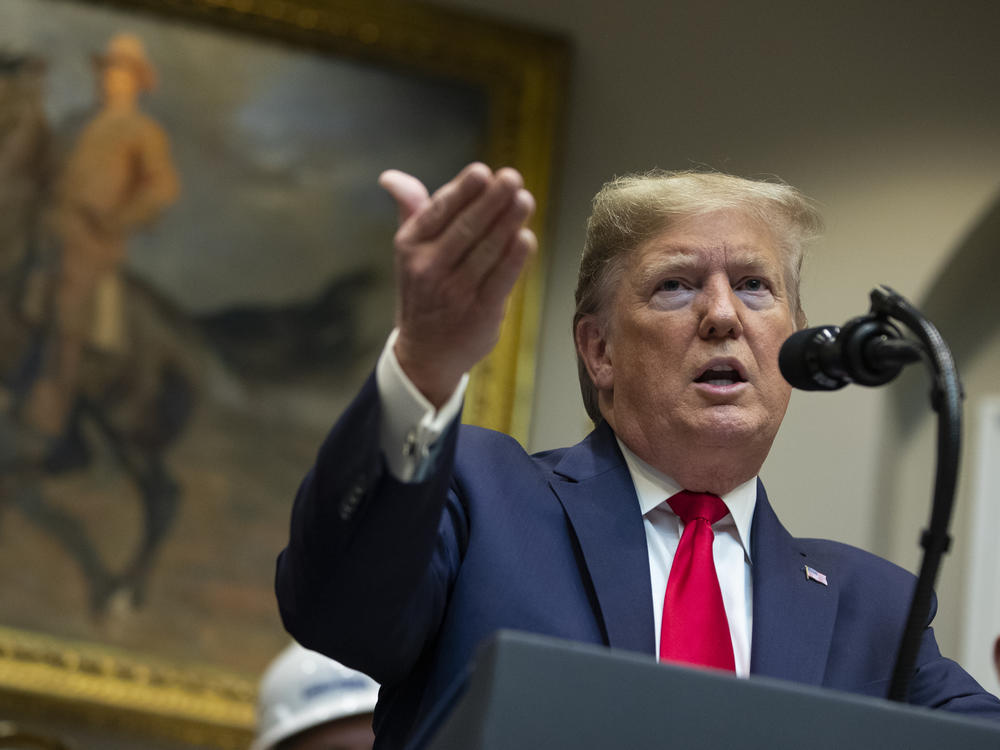 President Trump proposes changes to the National Environmental Policy Act at the White House in January. The final rules aims to speed approval of pipelines and other infrastructure.