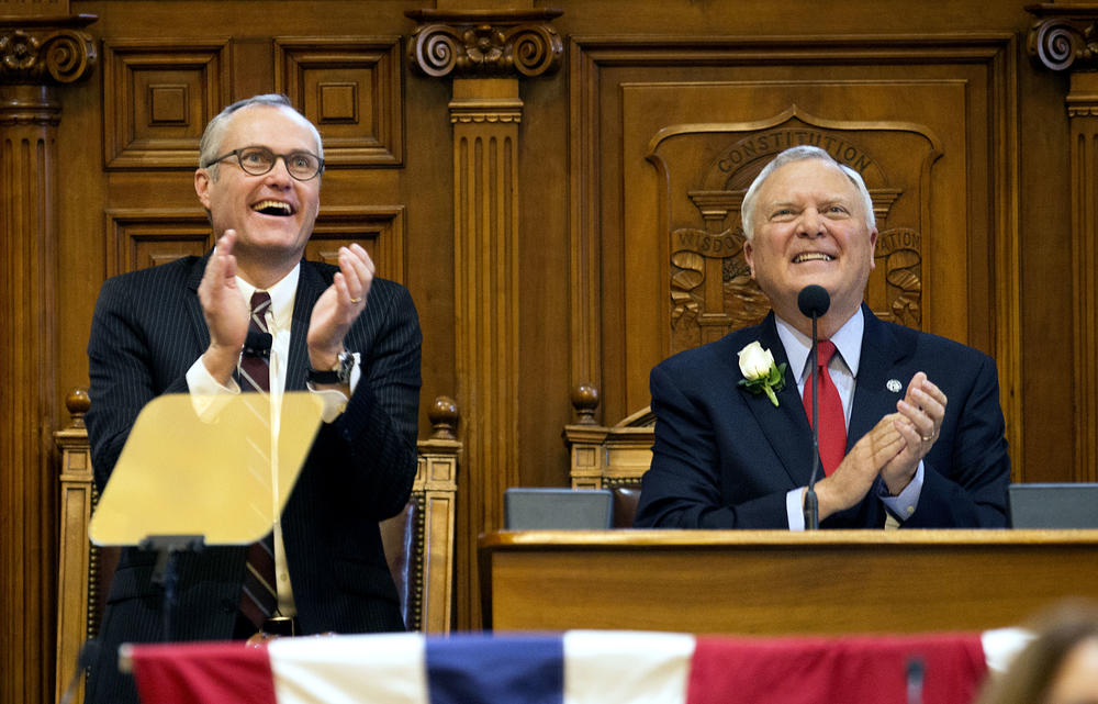 Georgia Gov. Nathan Deal, right, looks up along with Lt. Gov. Casey Cagle, left, while speaking during an inaugural ceremony to begin his second term in office at the state Capitol.